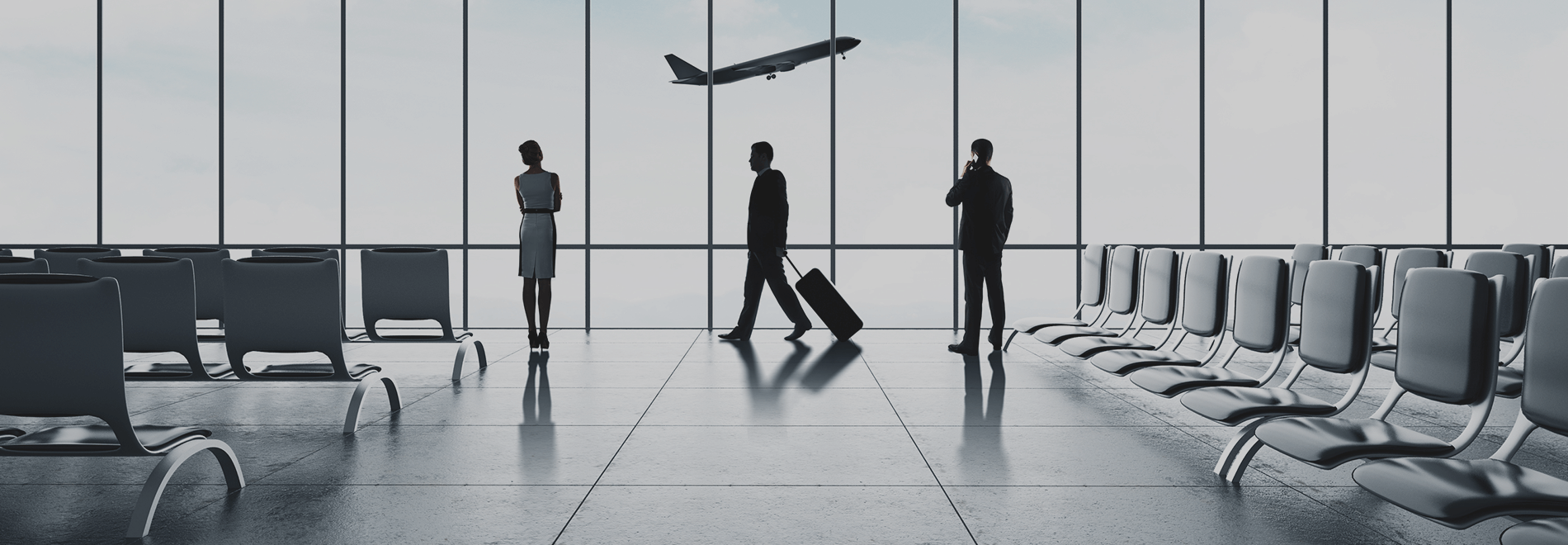 Passengers receiving VIP airport assistance in a modern Istanbul terminal, with a plane visible through the window, representing our meet and greet services.