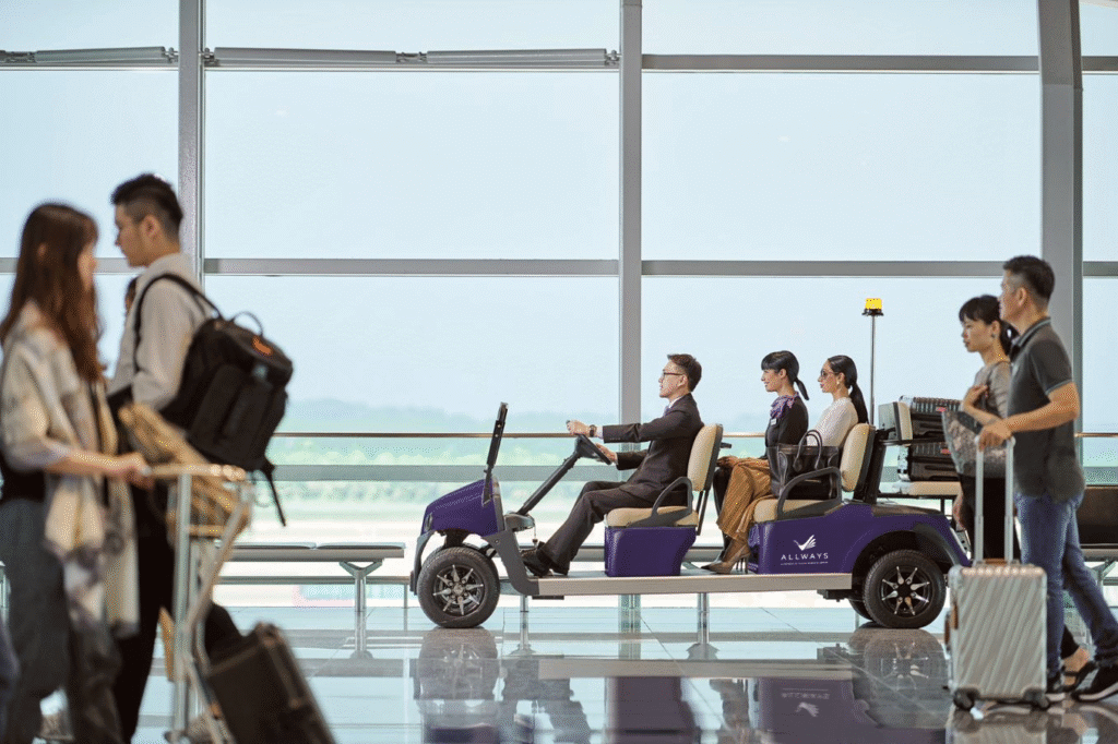 Passengers enjoying a VIP buggy service for a fast and easy terminal transfer at Istanbul Airport with a professional driver.